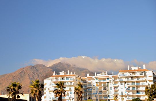 Estepona, buildings situated between the mountains and the beach