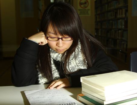 Asian girl studying in university