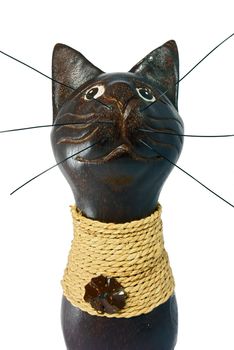 Brown statuette of the cat isolated over white