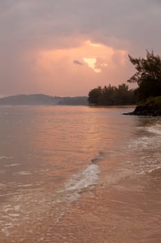 Sunrise on Anini beach with Kilauea lighthouse in the distance