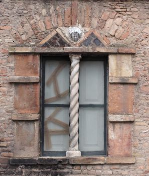 Broken window of old Medieval house