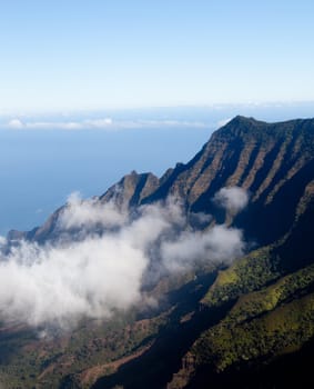 Low clouds start to form on Kalalau valley in Kauai Na Pali Coast