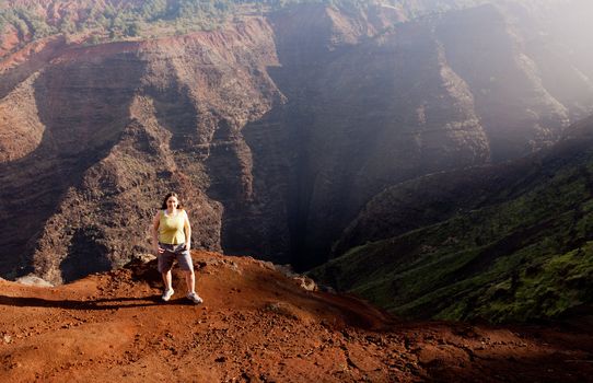 Early light illuminates the steep rock sides of Waimea Canyone on Kauai