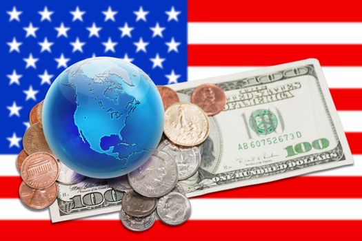 World currency. Globe view to North America on dollar coins and banknote. Focus on globe.