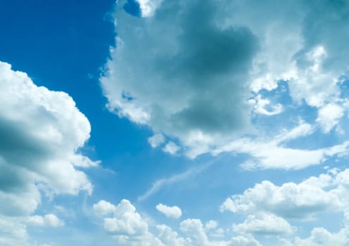 dramatic blue sky with clouds, for backgrounds.