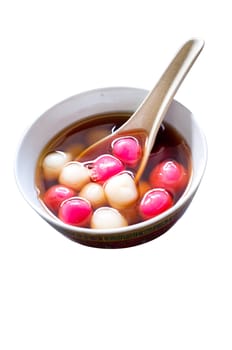 a bowl of traditional delicacy for chinese, glutinous rice balls for arrival of winter. Isolated on white.