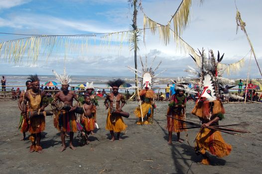 Traditional tribal dance at mask festival.
7th Gulf Mask Festival, Toare Village, Gulf Province, Papua New Guinea on June 19, 2011