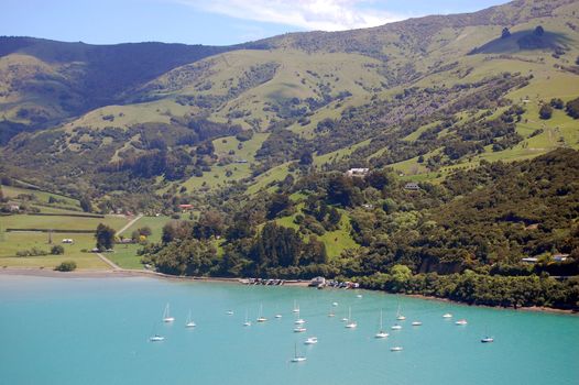 Yachts at sea bay, Banks Peninsula, New Zealand