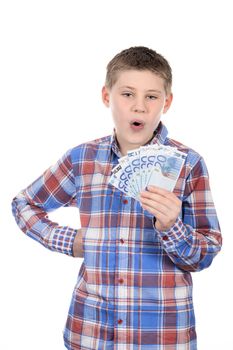 Young boy with euro notes on white background