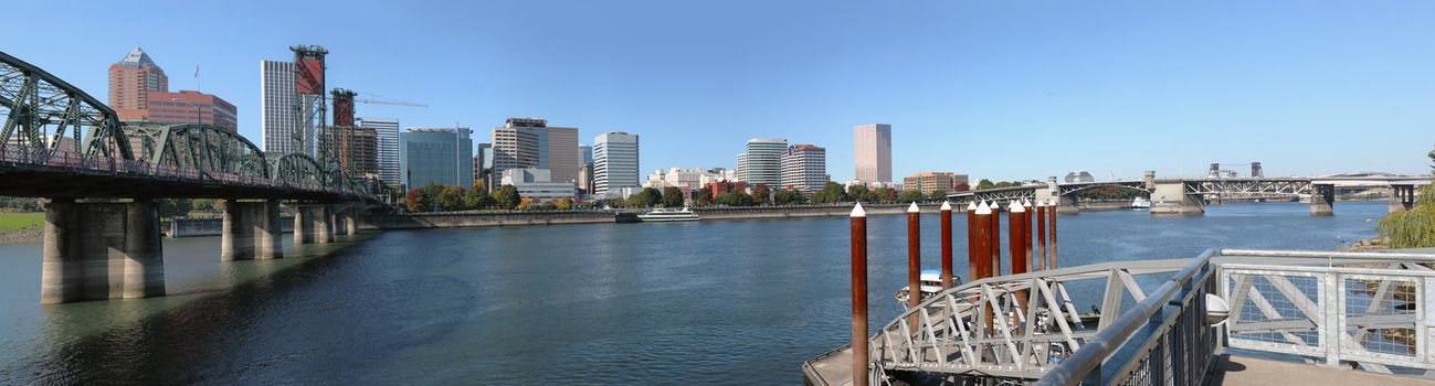 A panorama of Portland Oregon skyline & two bridges.