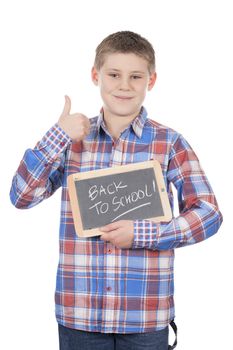 young boy holding slate on white background