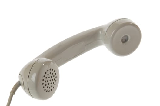 old gray vintage telephone handset isolated on white background