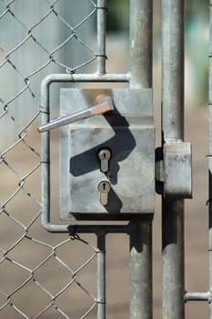 Metallic outside doorknob with two locks for security