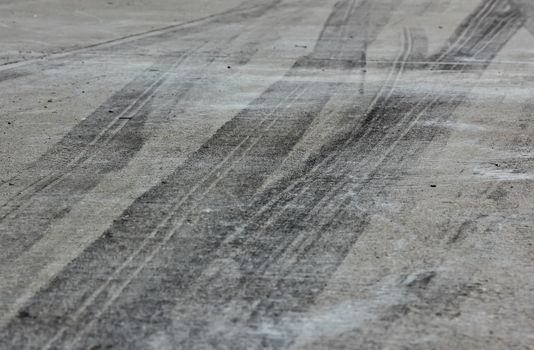 Background with tire marks on road track
