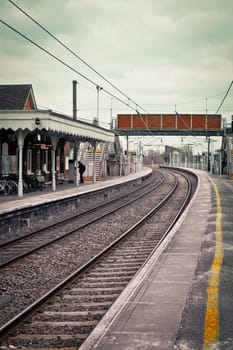 Railway station in the UK in muted tones