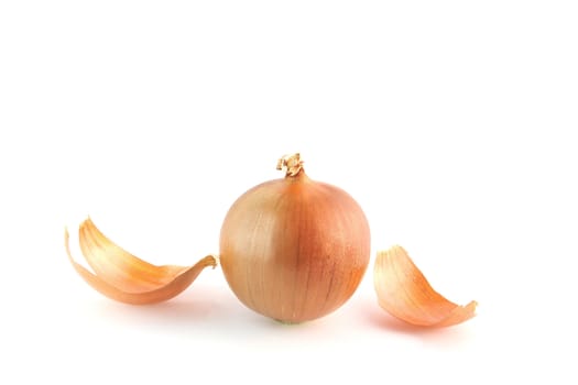Ripe golden onions on white background.