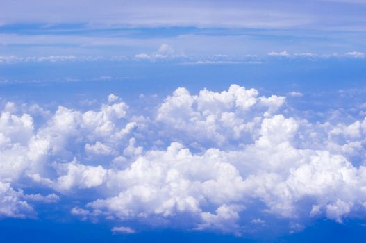 a view of sky, above of clouds.