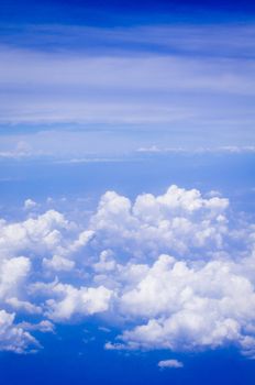 a view of sky, above of clouds.