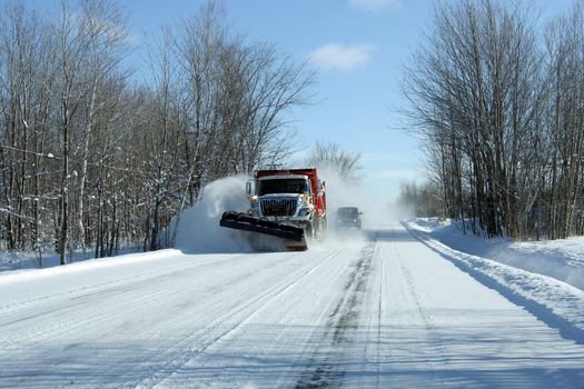 snowplow in action after a snowstorm