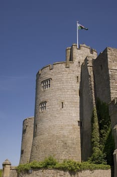 A turret on a castle with a flag flying
