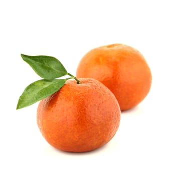 fresh mandarin with leaf isolated on white.