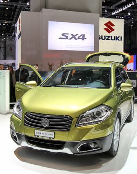 GENEVA - MARCH 8 : Suzuki SX4 S on display at the 83st International Motor Show Palexpo - Geneva on March 8, 2013 in Geneva, Switzerland.