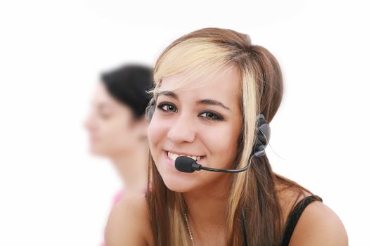 Beautiful representative smiling call center woman with headset.