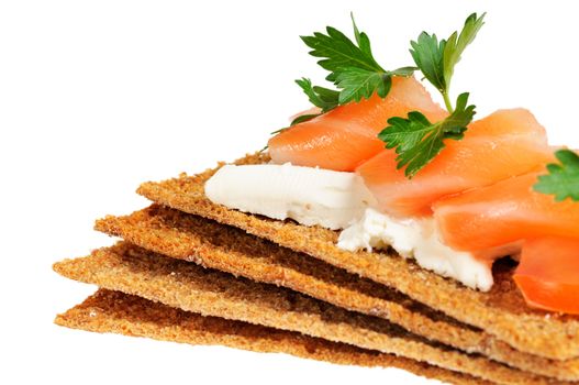 Snack. Bread with feta cheese and salmon. Isolated on white.