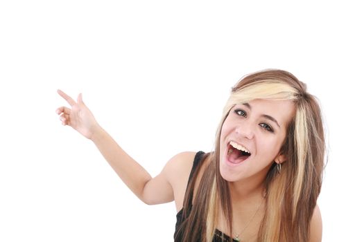 Closeup of cheerful young woman pointing at something interesting over white background