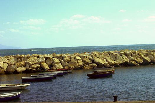 bouts situating near the pier of Napoli