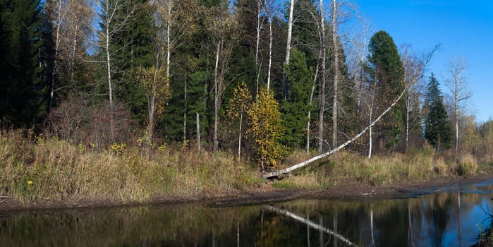 Autumn on the taiga river of Verhnjaja Ters