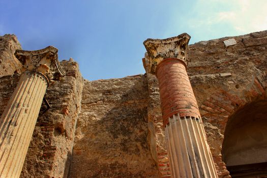 Ancient columns, wall, are in Pompeii, Italy