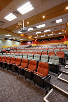 Lecture hall with colorful chairs in university