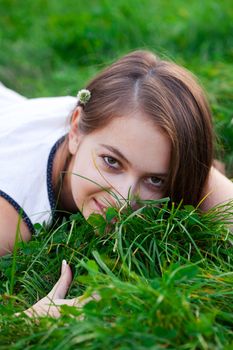 portrait of a beautiful young woman with flower  outdoor