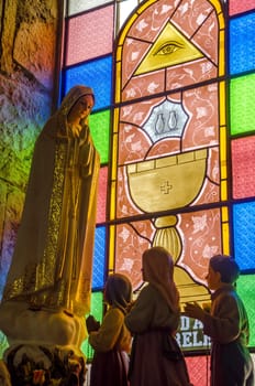 Colorful statue of the Virgin Mary in a church in Choachi, Colombia