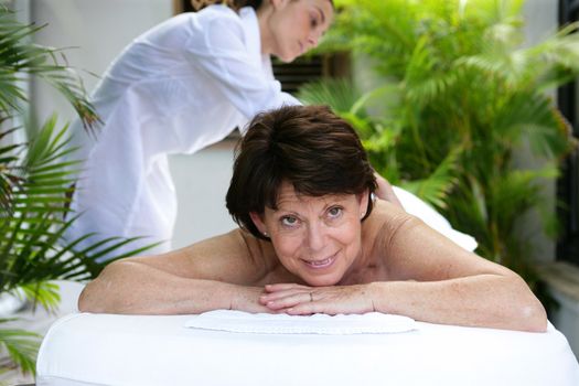 Mature woman having a massage