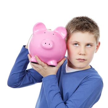boy with big pink piggy bank on white background
