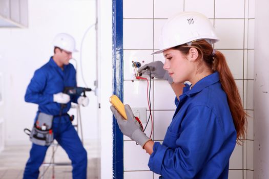 Electricians at work