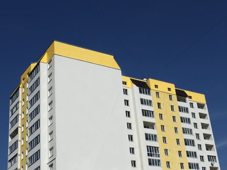 Building new construction on the background of dark blue sky