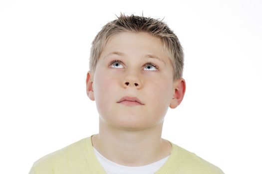 Portrait of boy looking up.Isolated on white