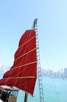 Junk boat flag along the harbour in Hong Kong