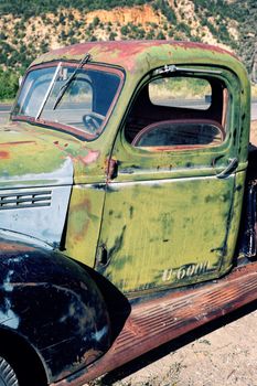 destroyed old truck out in the desert