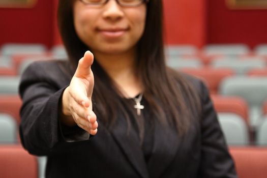 Asian businesswoman with shaking hand