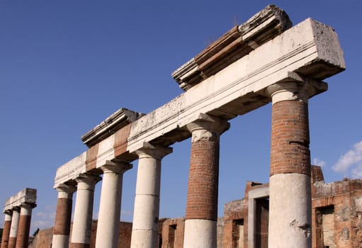 Columns in the Forum in the Roman city of Pompeii.  It was completely buried by an eruption of Mount Vesuvius in AD 79.
