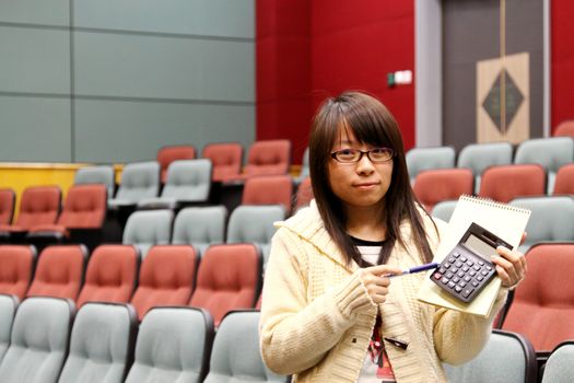 Asian student in lecture hall