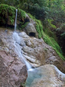 Emerald color water in tier sixth of Erawan waterfall, Erawan National Park, Kanchanaburi, Thailand