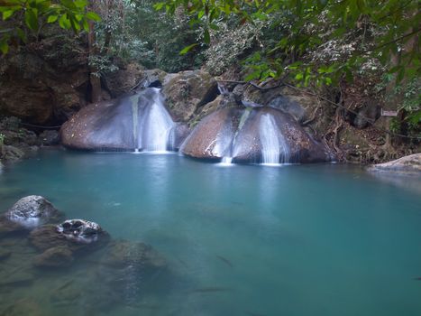 Emerald color water in tier fourth of Erawan waterfall, Erawan National Park, Kanchanaburi, Thailand