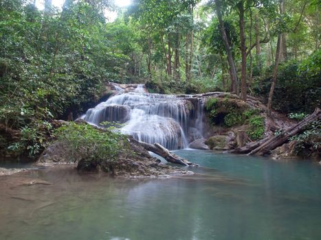 Emerald color water in tier first of Erawan waterfall, Erawan National Park, Kanchanaburi, Thailand