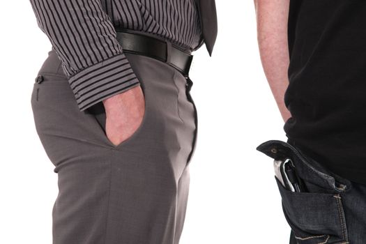 Cropped view image of a smartly dressed pickpocket sizing up his victim standing just behind him eyeing his wallet protruding from his rear pocket