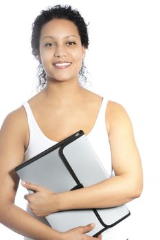 Beautiful young female African American graduate student or business woman holding a stylish folder in her arms as she smiles at the camera isolated on white